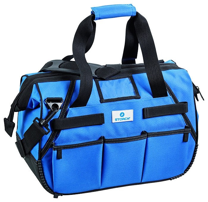 Сумка для инструментов STORCH Werkzeugtasche. Размер: 43 x 24 x 28 см. Из прочной нейлоновой ткани. Ручной захват и съемный ремень для переноски. Внутренние и наружные карманы частично на молнии. Окошко для визитки. Твердое основание для безопасной установки. Арт.: 29 59 00.